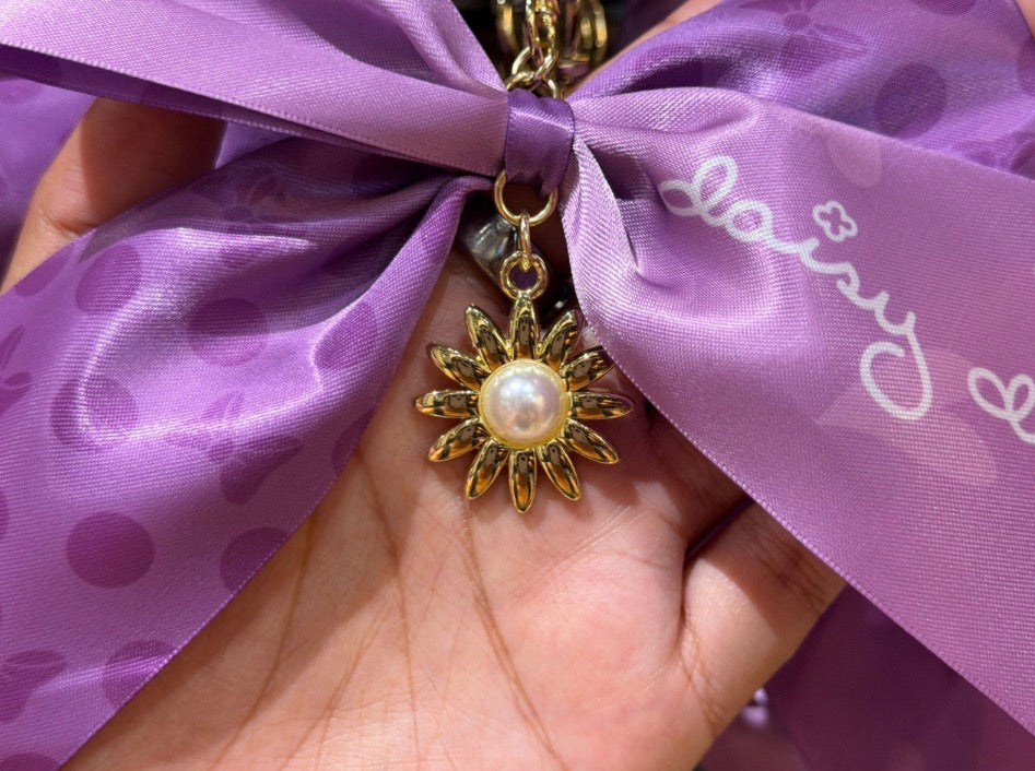 Daisy Duck Charm Bow
