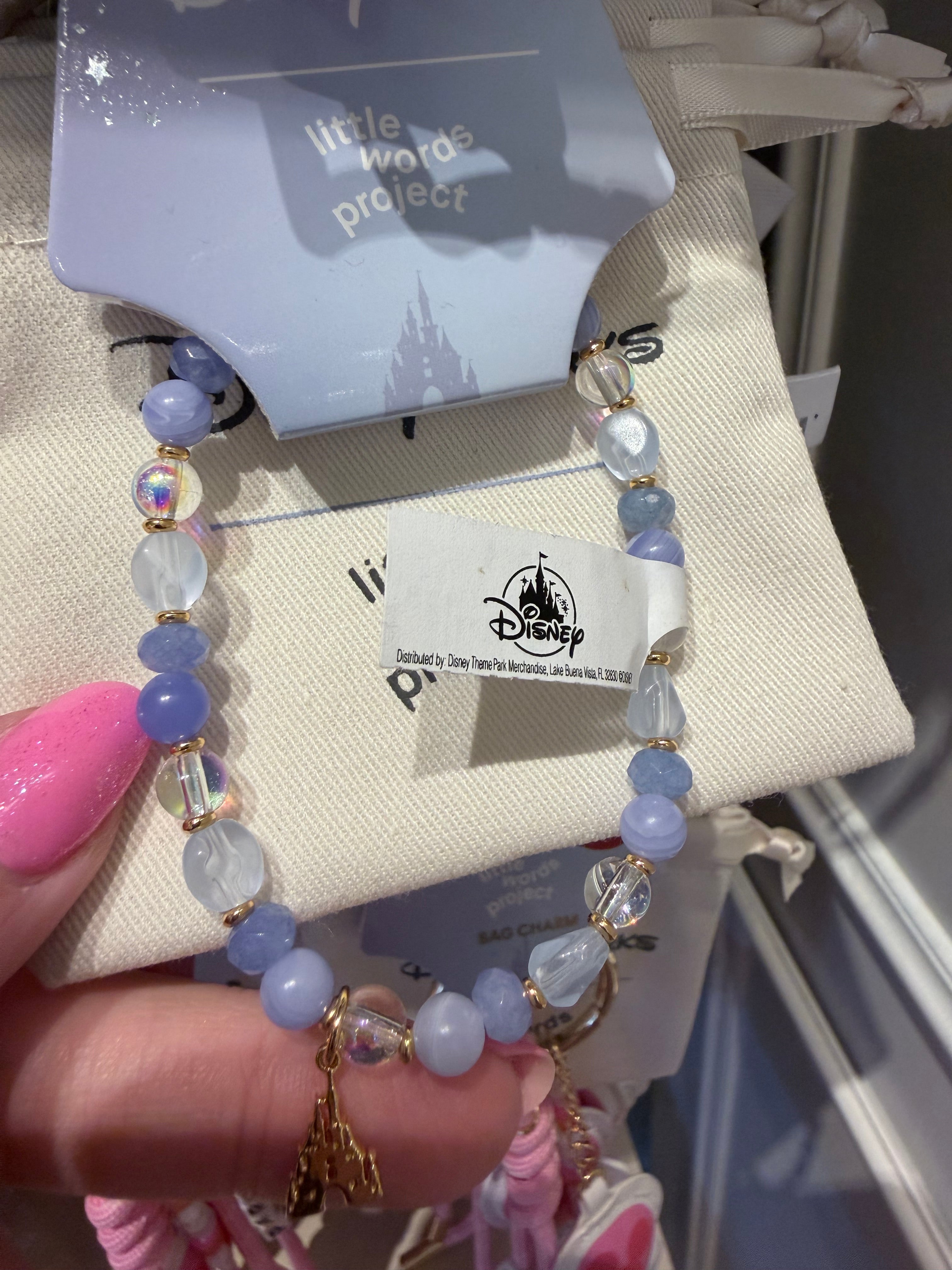 Beaded bracelet with a visible brand tag in the background