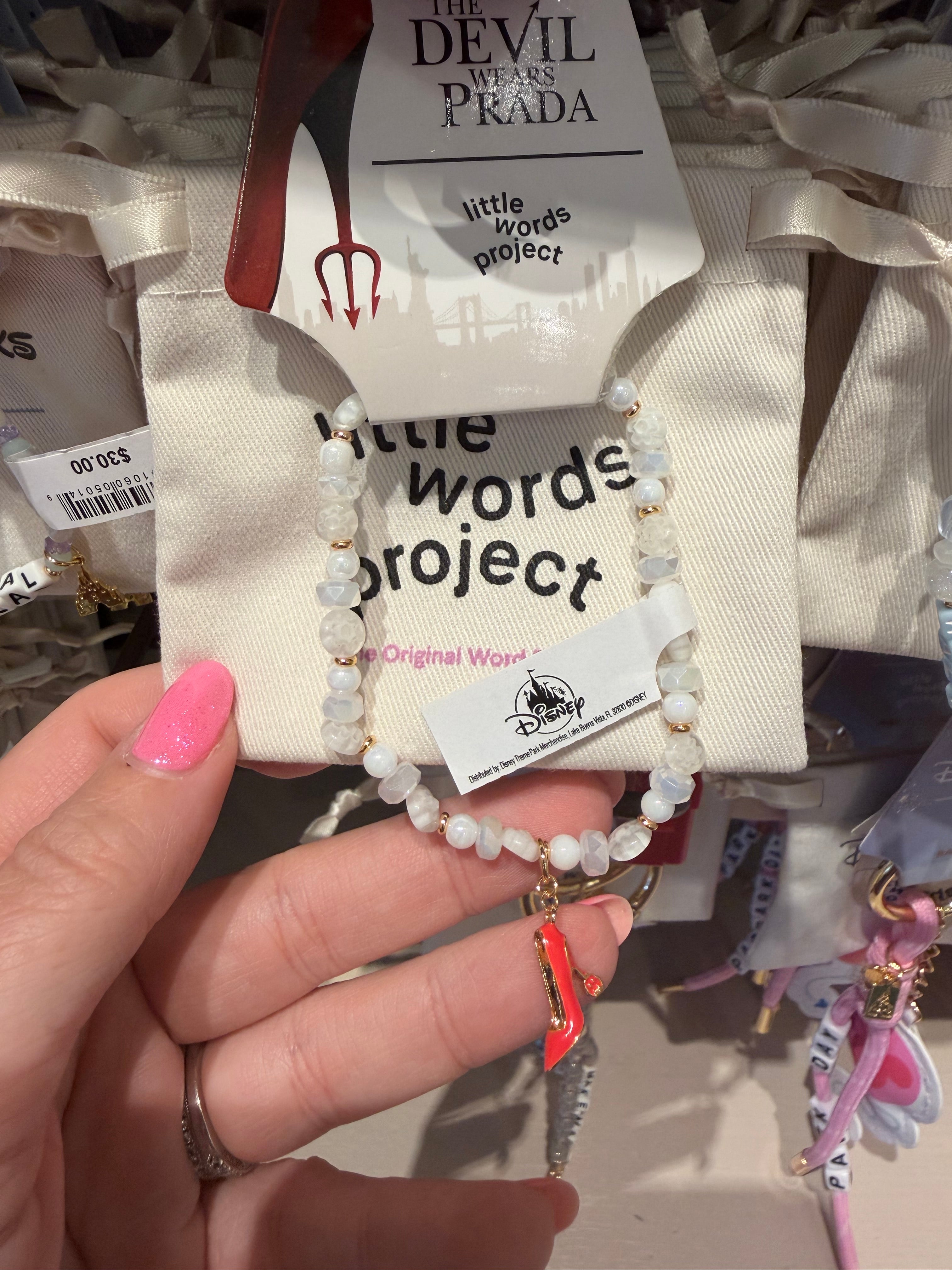 Bracelet on a card with 'Little Words Project'