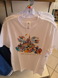 White t-shirt with colorful Disney character design on a hanger.