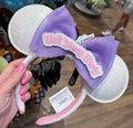 Mouse ears with a purple bow labeled 'Walt Disney World'