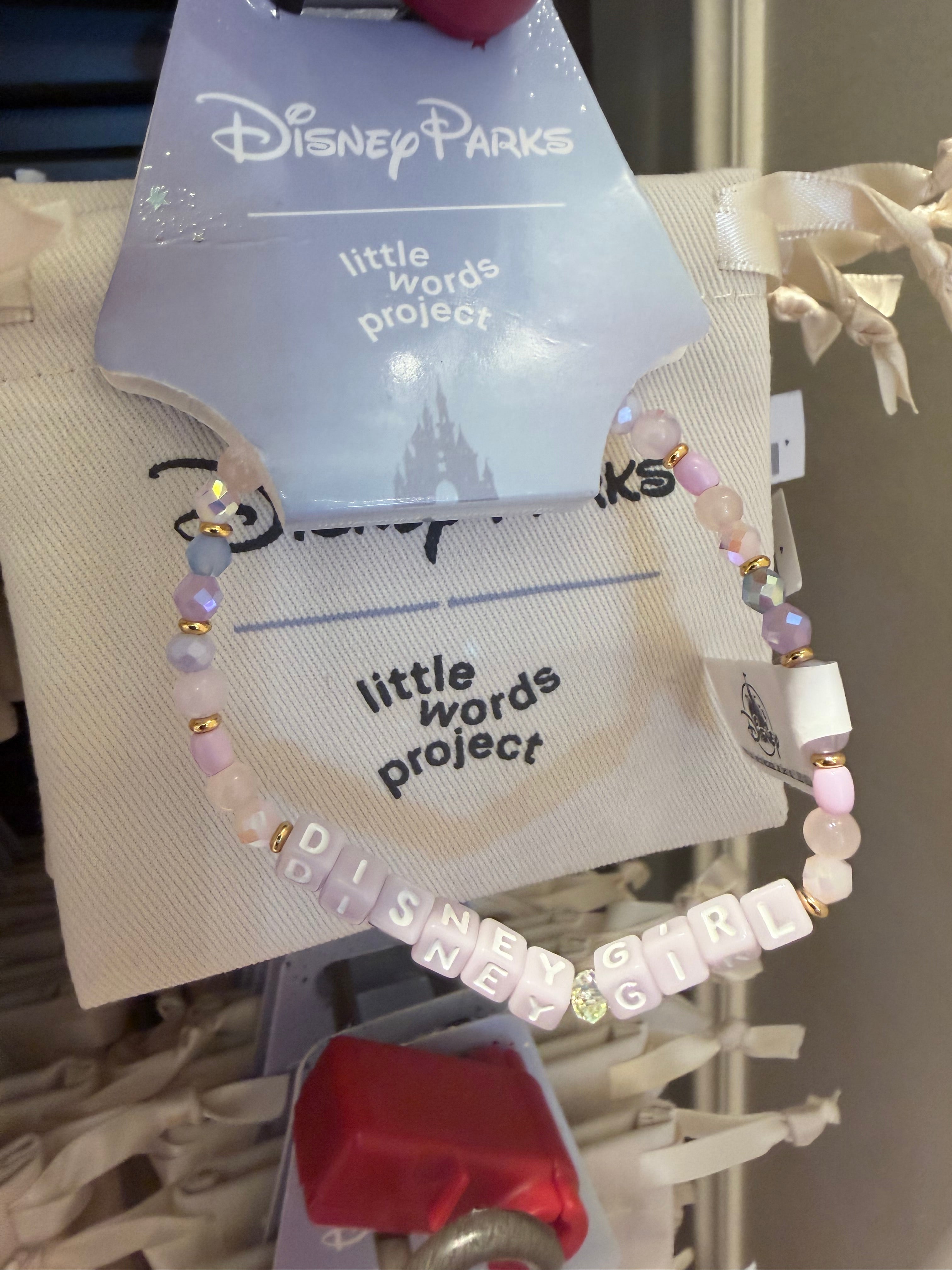 Bracelet with 'little words project' branding on a display card.