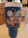 Blue tumbler with Disney characters and castle design on a white background