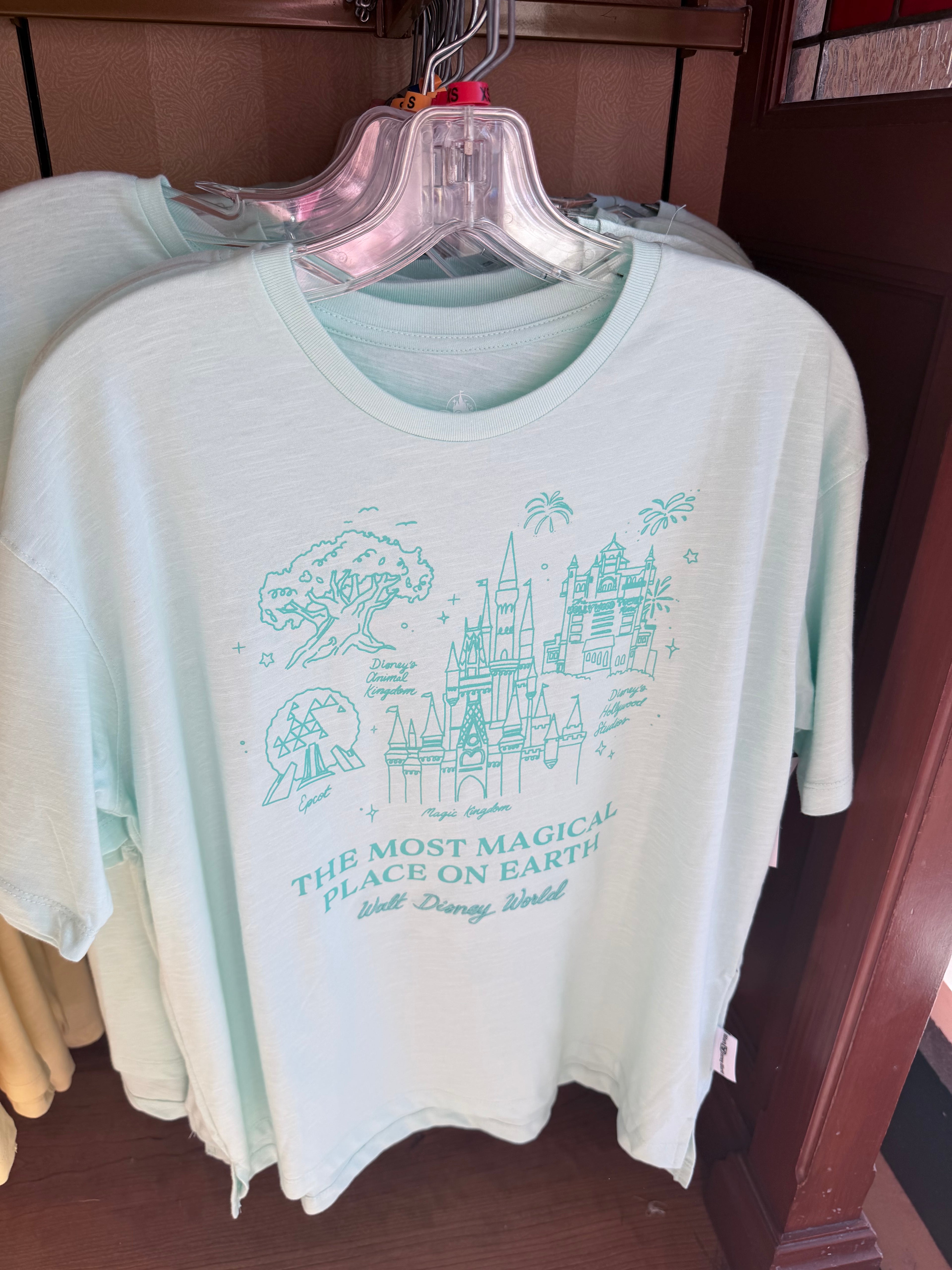 Light Green shirt with green text and graphics
